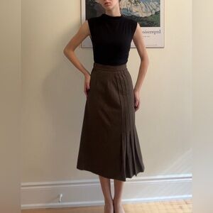 Asymmetrical pleated wool skirt